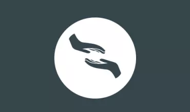 Icono de manos extendidas en un círculo blanco sobre fondo oscuro.